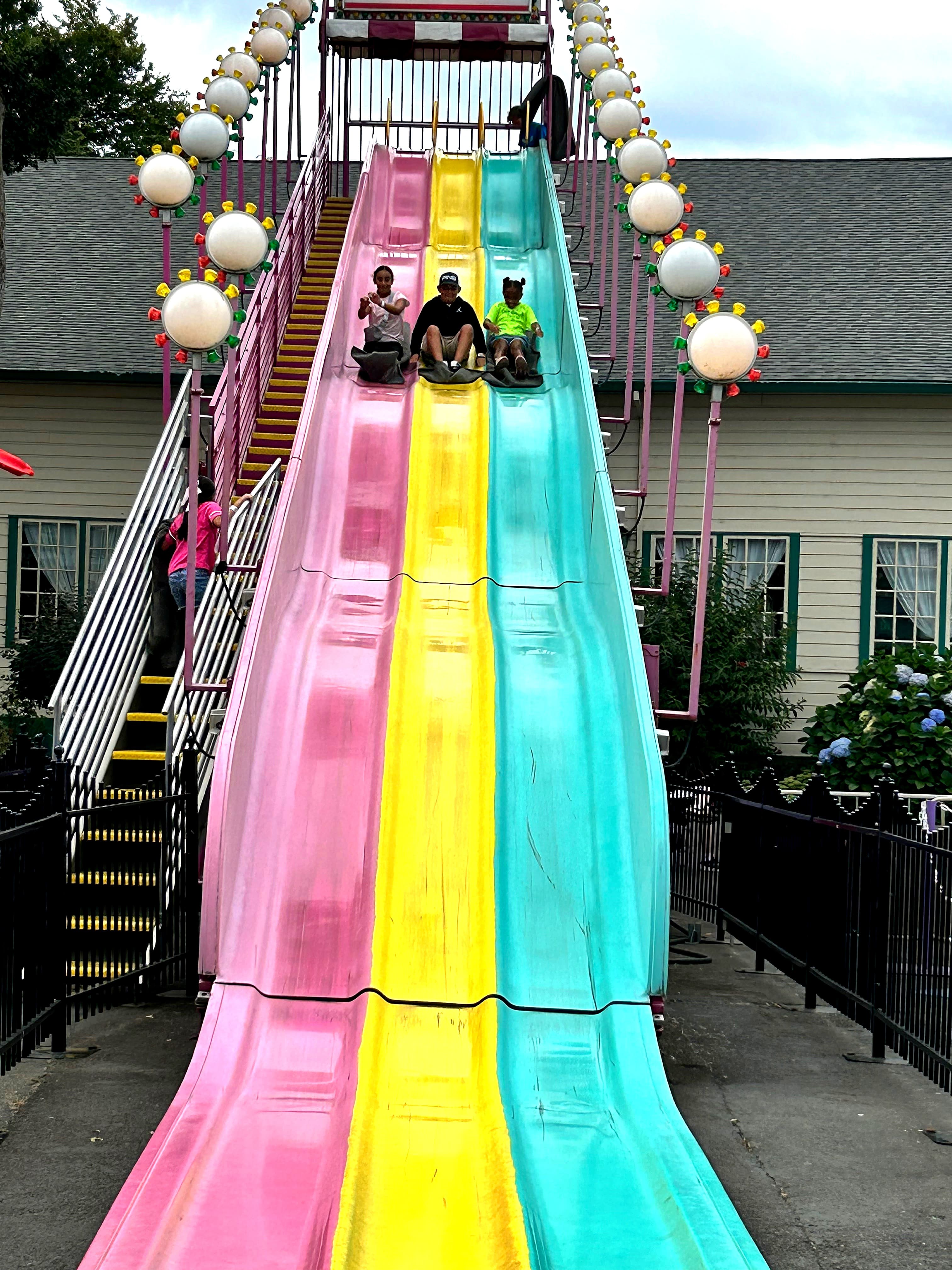 Kids riding the giant slide at Oaks Park Day